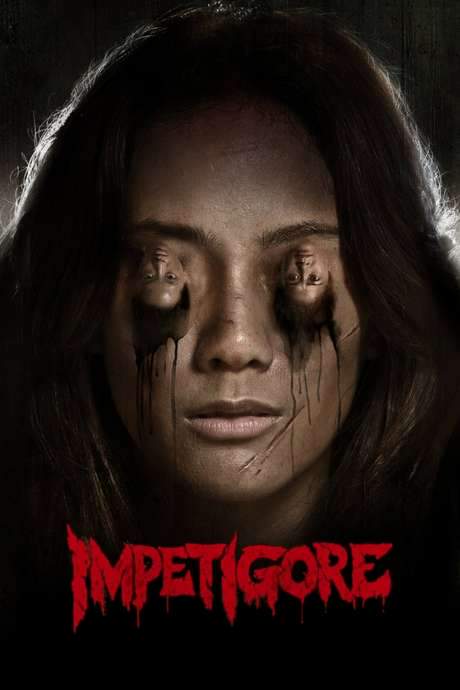 A woman's face with eerie, dark streaks under her hollow eyes, each eye socket containing a tiny, screaming face. Below her, "Impetigore" is written in red, jagged letters. The background is dark and shadowy.