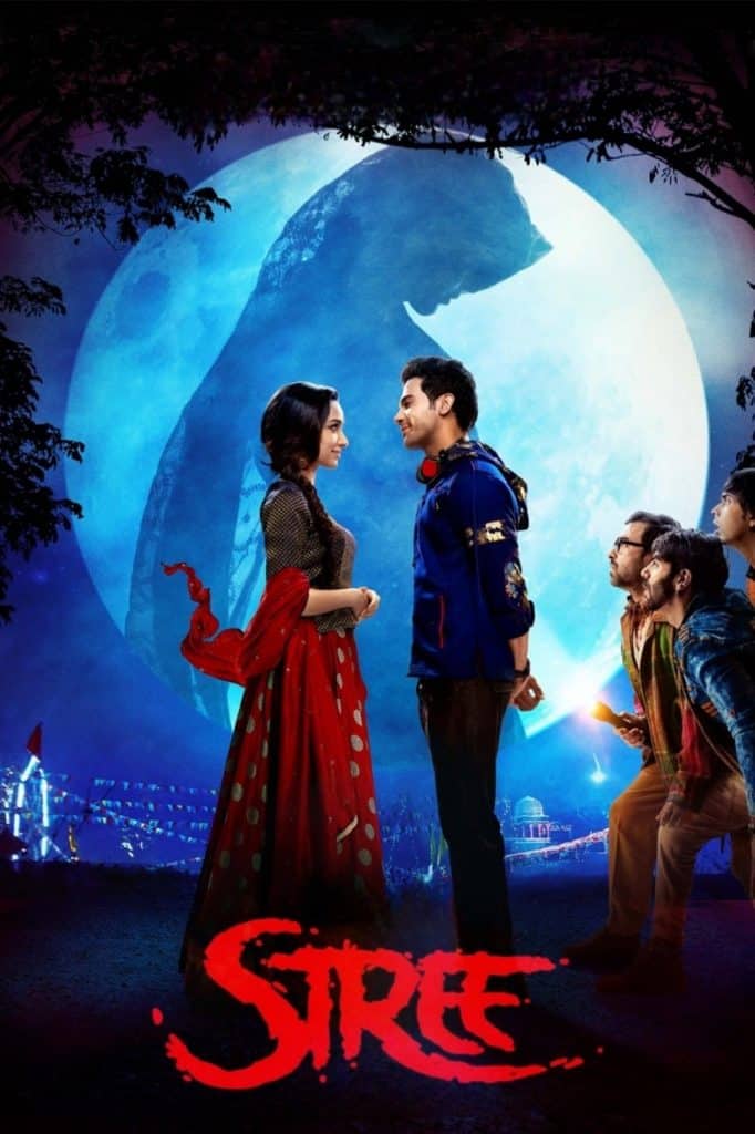 A woman in a red saree faces a man in a blue jacket under a large moon, with three men watching. A shadowy figure looms in the moonlight, evoking the eerie suspense of Nightmare On Elm Street. "Stree" in red text is at the bottom.
