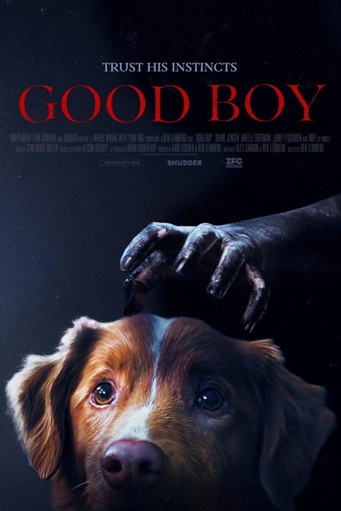A movie poster for “Good Boy” shows a dog’s face with a creepy, dark hand reaching toward its head. The text above reads, “Trust His Instincts. Good Boy.” The background is mostly black.